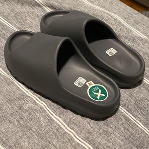 Grey adidas Yeezy slides